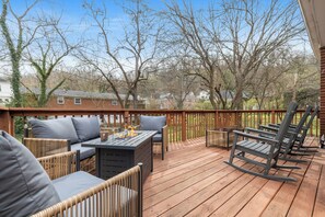 Relax on the deck around our firepit table or rocking chairs.