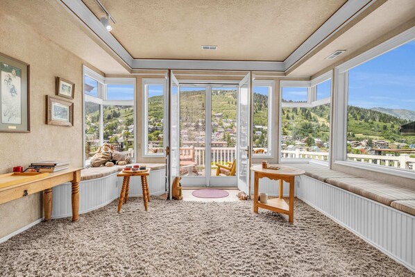 Living room: Smart TV with basic cable, gas fireplace, central heat, window A/C unit and portable fans in summer