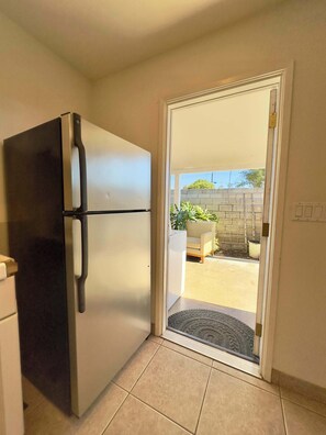 Entrance straight into kitchen