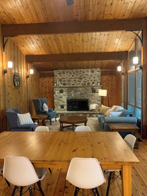 Dinning area looking toward fireplace with electric insert. 