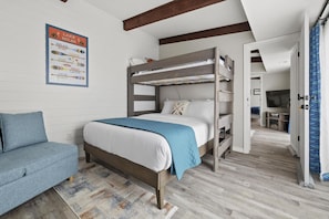 Bedroom 2 with a queen bed and a twin loft bed. Also a Roku tv.