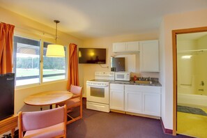 Kitchen | Dining Area | TV | Single-Story Unit