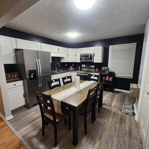 Dining Room and Kitchen, Laundry to the right of dining table