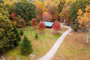 Secluded retreat on 10 acres in the Hocking Hills, boasting stunning autumn foliage and a peaceful ambiance.