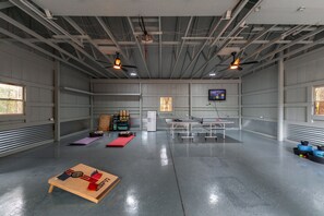 Massive game room with life size games and outdoor yoga
