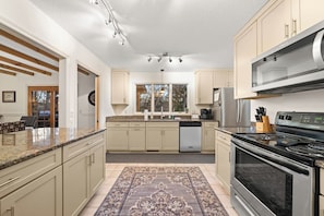 Our spacious kitchen features everything you need to cook, bake, and enjoy home-cooked meals.