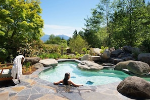 Unwind at the Skamania Lodge outdoor spa, surrounded by nature's beauty.