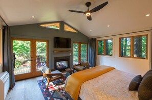 Unwind in a spacious, sunlit bedroom with modern amenities and a cozy atmosphere.