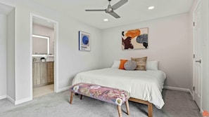 Unwind in a king-sized bed with premium linens.