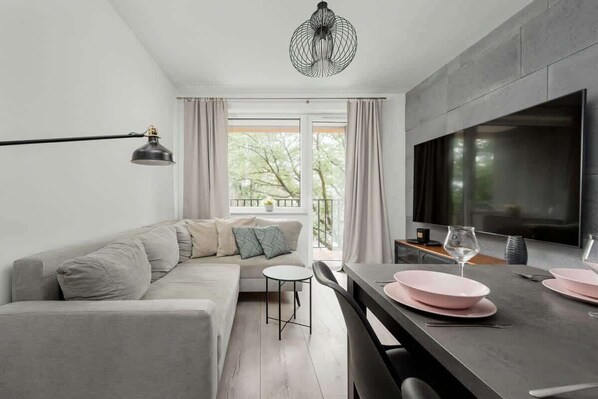Living room with dining table and chairs.