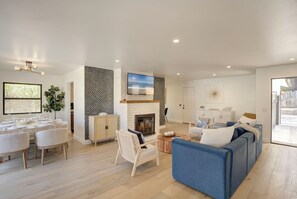 Living Room with a Fireplace and TV