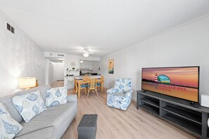 Relax in the Living Area in the AC with comfy Furnishings, Flat Screen Cable TV, and Free Wi-Fi!