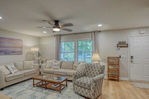 A welcoming living room to retreat to after a day on the water. 