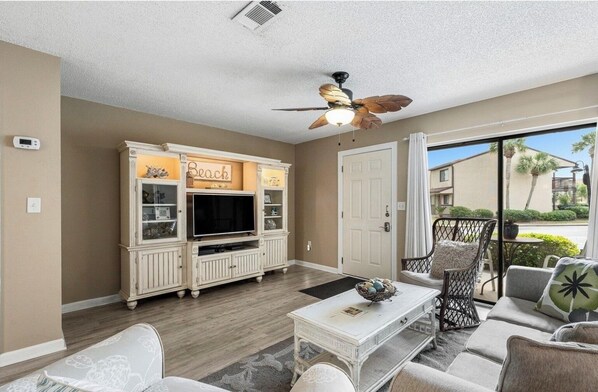 A spacious living room opens to the kitchen with an open concept! 