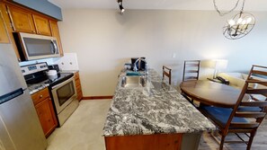 Floor, Indoors, Flooring, Furniture, Table
