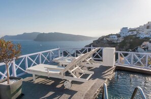 Thrilling Santorini Suite | Ragus Suite | 1 Bedroom | Min. Children Age: 12 Years | Spacious Shared Sun Terrace and Swimming Pool with Breathtaking Caldera View | Oia