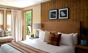 Bright and cozy bedroom with modern decor and plenty of natural light.