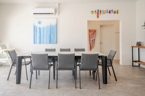 Step into our inviting dining area, where every meal and gathering is a cherished memory in the making. Join us at the table for shared moments filled with joy and laughter.
