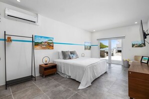 Unwind in comfort and style in our bedroom oasis, complete with AC, TV, and a private bathroom. Enjoy the perfect retreat after a day of exploration, where every comfort is tailored to your relaxation. Welcome to your haven away from home.