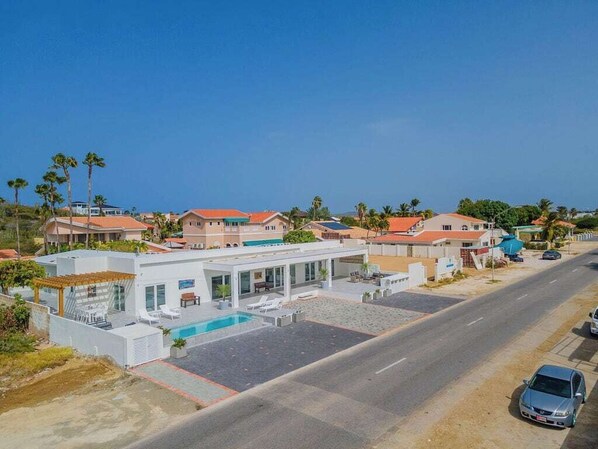 Front of Villa
Welcome to your picturesque escape! Discover serenity and charm as you step into the inviting front of our villa. Experience the perfect blend of elegance and comfort from the moment you arrive.