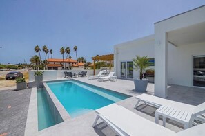 Pool and deck 
Dive into relaxation and soak up the sun in our inviting pool area. With comfortable lounge chairs awaiting your arrival, every moment by the pool is a rejuvenating escape into paradise.