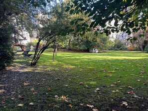 Kids play area in middle lawn communal garden