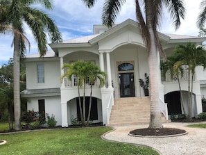 Beautiful home located 1 mile from Boca Bridge with elevator and private pool