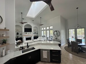 Open floor plan - huge kitchen overlooks family room w/island and sitting area
