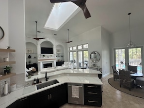 Open floor plan - huge kitchen overlooks family room w/island and sitting area