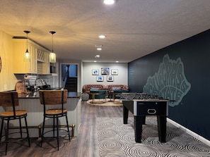 A full bar and game room in the lower level. All the barware you could want.