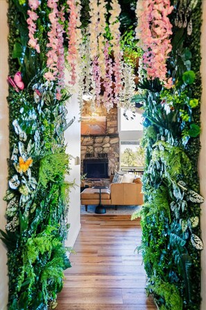 Hallway adorned with a green wall making your trip feel extraordinary