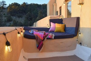 An outdoor daybed is fantastic for enjoying morning coffee or an evening sunset. 