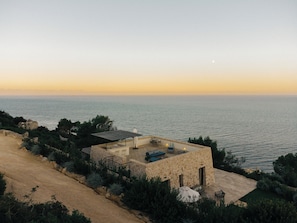 Overview of the Villa with lush gardens and a breathtaking view of the Adriatic.