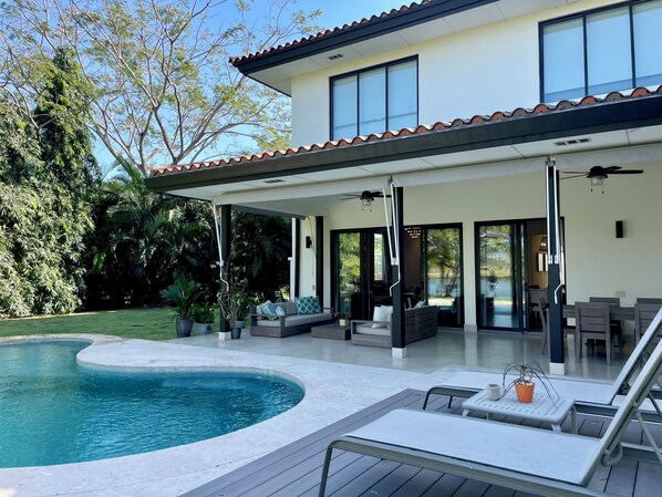 Private pool and cozy outdooor furniture 