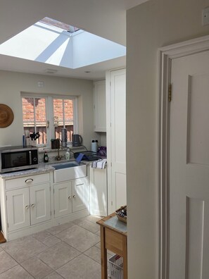 Your kitchinette includes a Microwave/Oven/Airfyer combined & a washing / drier