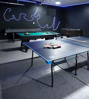 Ping pong, pool, darts, foosball, 4 arcades, ski ball, and more!