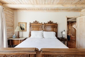 Bedroom Two, with antique Queen bed on main level