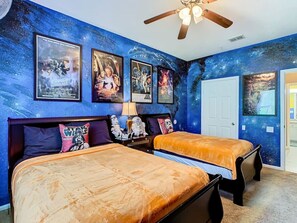 Star Wars–themed bedroom featuring 1 Queen bed and 1 Twin bed — perfect for fans of the galaxy!