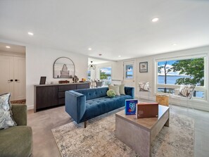 Living Room: Relax in style with breathtaking water views