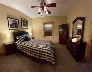 The lower level bedroom is nicely furnished and offers USB chargers on the lamps