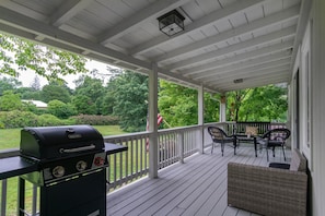 Relax and enjoy your morning coffee on the side porch with seating for up to 6.