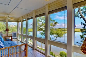 An air conditioned four seasons room overlooking BHI Creek provides all the amazing views without the heat and bugs!