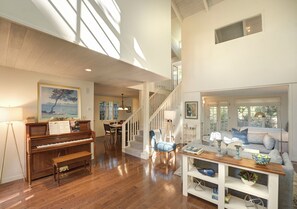 Living Room has a Piano