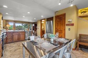 The dining table offers seating for 4 guests.