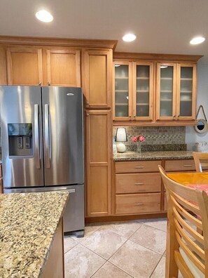 Kitchen - Updated kitchen with stainless steel appliances and granite countertops.