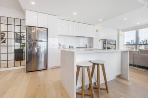 Pick up some fresh, local produce at the nearby Queen Victoria Market to cook up in the fully equipped kitchen, where you’ll also find a dishwasher for easy clean-up.  
