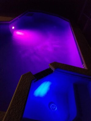 Relaxing poolside retreat, perfect for lounging and enjoying sunny days.