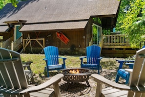 Our brand-new fire pit and 6 polywood Adirondack chairs!