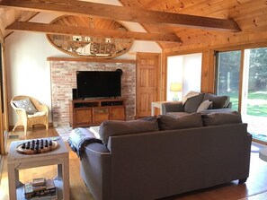 Open living room with flat screen TV