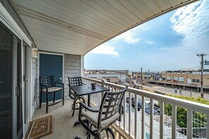 Outdoor dining area at covered balcony